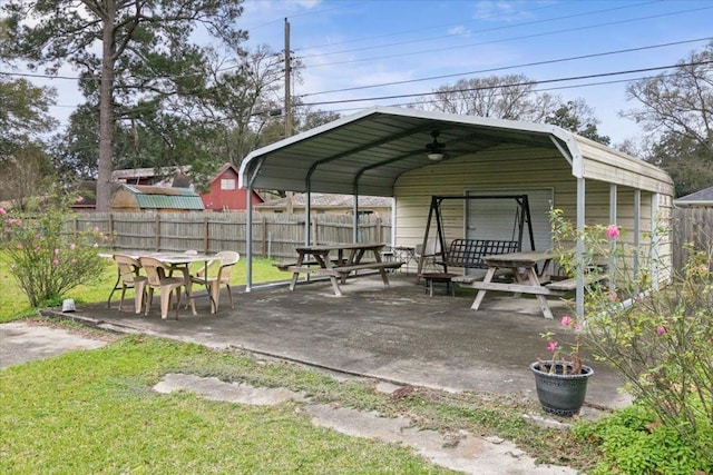 view of patio / terrace featuring ceiling fan