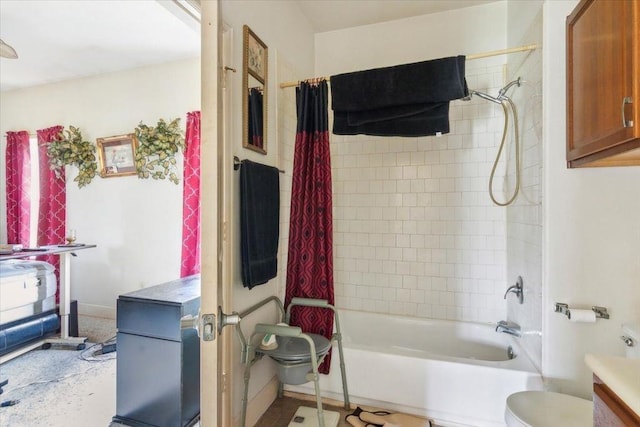 full bathroom with shower / tub combo, vanity, and toilet