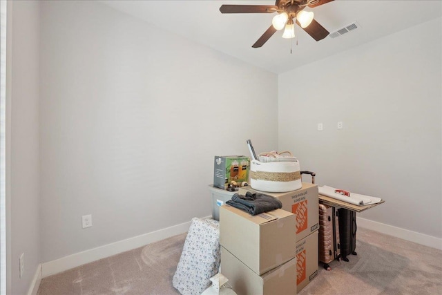 560 Lyndale St, Vidor, TX 77662 - misc room featuring light colored carpet, a ceiling fan, and baseboards