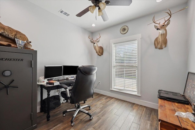 560 Lyndale St, Vidor, TX 77662 - office space featuring a ceiling fan, baseboards, and wood finished floors