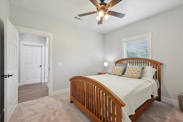 560 Lyndale St, Vidor, TX 77662 - carpeted bedroom with baseboards and ceiling fan