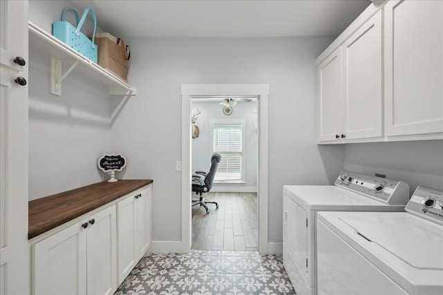 560 Lyndale St, Vidor, TX 77662 - laundry room with cabinet space, independent washer and dryer, and baseboards