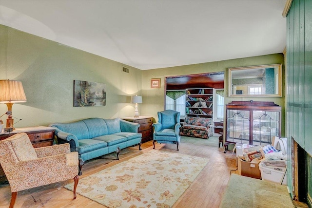 living room with light hardwood / wood-style flooring