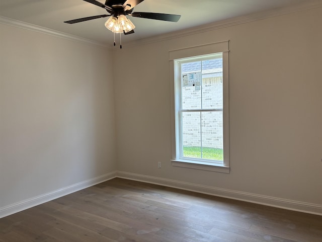 6560 Brayfield Ln, Beaumont, TX 77706 - unfurnished room with plenty of natural light, crown molding, dark wood-type flooring, and a ceiling fan