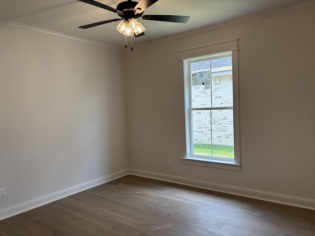 6560 Brayfield Ln, Beaumont, TX 77706 - unfurnished room with healthy amount of natural light, dark wood-style flooring, ornamental molding, and ceiling fan