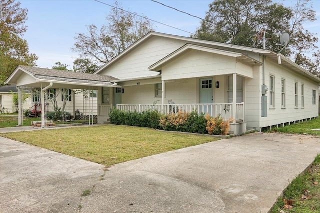 view of front of house with a front yard and covered porch