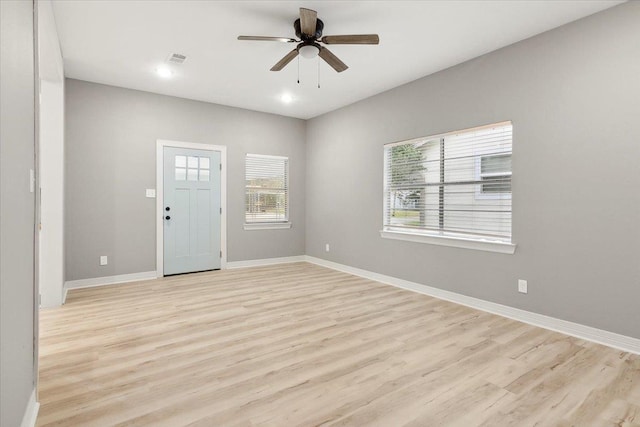 entryway featuring ceiling fan and light wood-type flooring