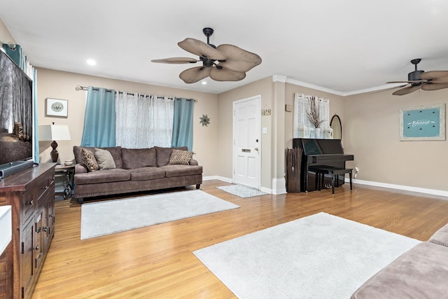 970 Evergreen Ln, Beaumont, TX 77706 - living room featuring a ceiling fan, light wood-type flooring, baseboards, recessed lighting, and crown molding