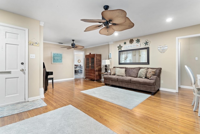 970 Evergreen Ln, Beaumont, TX 77706 - living area with a ceiling fan, light wood-type flooring, baseboards, and recessed lighting
