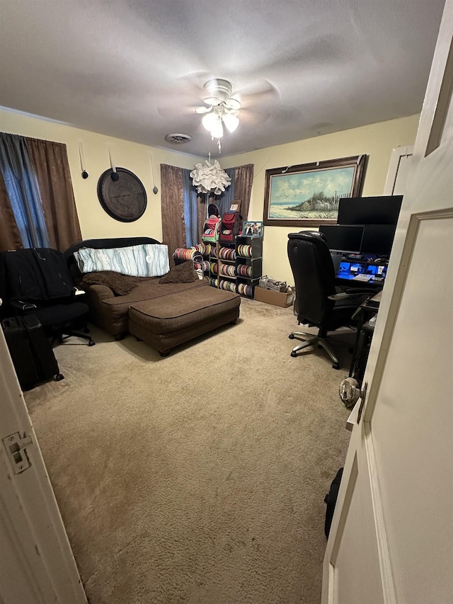 carpeted bedroom with ceiling fan