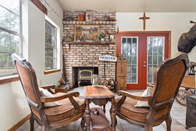 sitting room with light tile patterned flooring and french doors