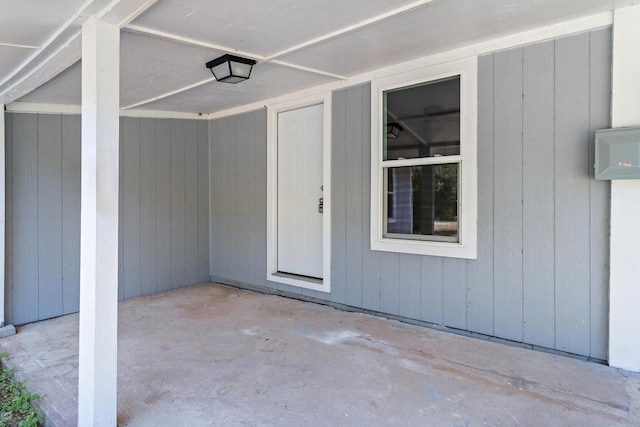 property entrance featuring a patio