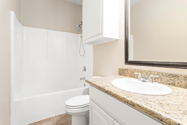 full bathroom with tile patterned flooring, shower / washtub combination, vanity, and toilet