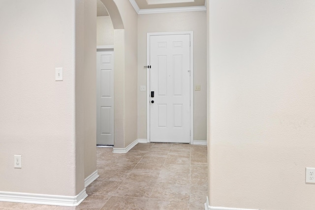 entryway with crown molding