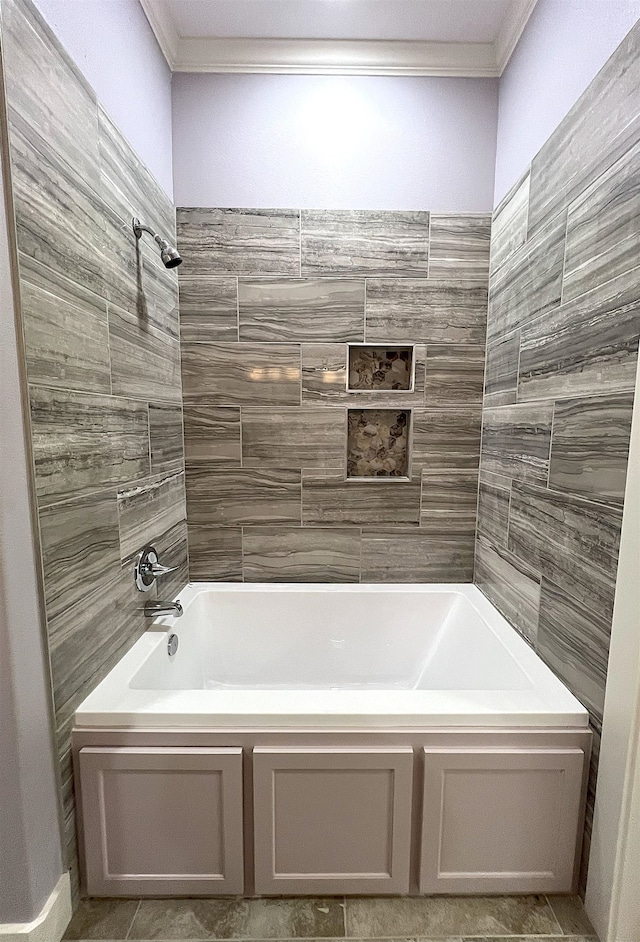 10675 Vinson St, Beaumont, TX 77713 - bathroom with ornamental molding and bathing tub / shower combination