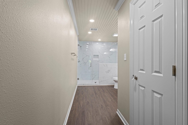 815 Central Dr, Beaumont, TX 77706 - corridor with dark wood-style floors, recessed lighting, baseboards, and a textured wall