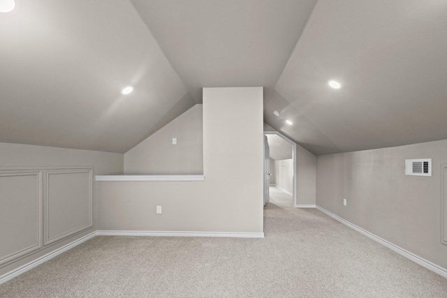 815 Central Dr, Beaumont, TX 77706 - additional living space with carpet floors, lofted ceiling, baseboards, and recessed lighting