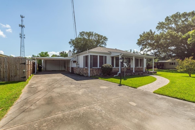 3012 Berry Ave, Groves, TX 77619 - view of front of property featuring covered porch, driveway, a chimney, and stone siding