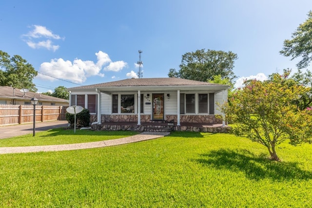 3012 Berry Ave, Groves, TX 77619 - view of front of house with covered porch and stone siding
