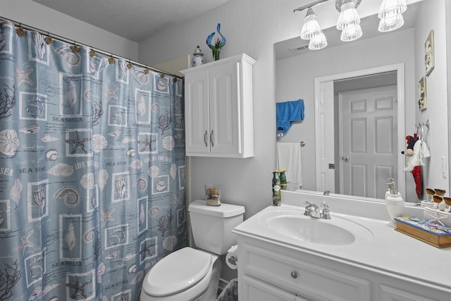 10393 Duncan Rd, Beaumont, TX 77713 - bathroom with vanity, a textured wall, and curtained shower