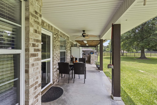 10393 Duncan Rd, Beaumont, TX 77713 - view of patio with wine cooler and a ceiling fan