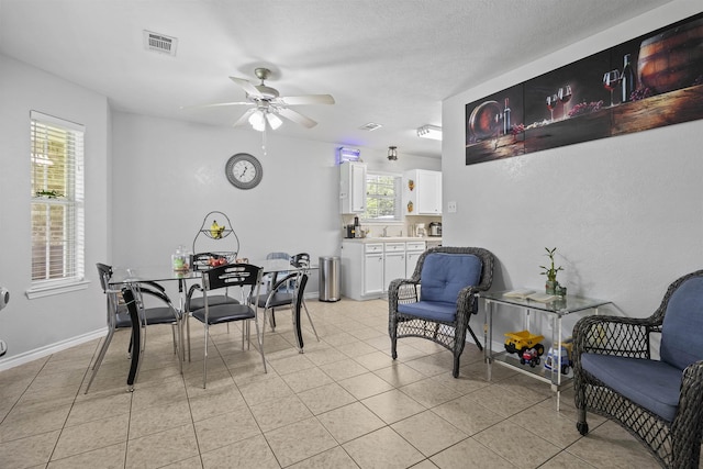 10393 Duncan Rd, Beaumont, TX 77713 - dining room with a ceiling fan and baseboards