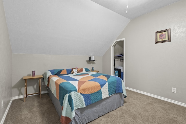 10393 Duncan Rd, Beaumont, TX 77713 - carpeted bedroom with vaulted ceiling and baseboards
