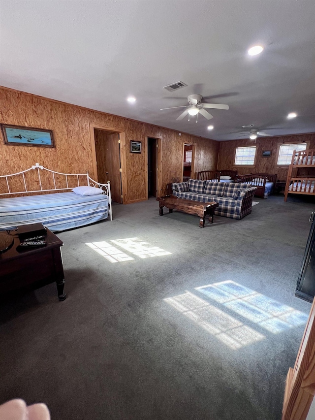 carpeted bedroom with visible vents and recessed lighting