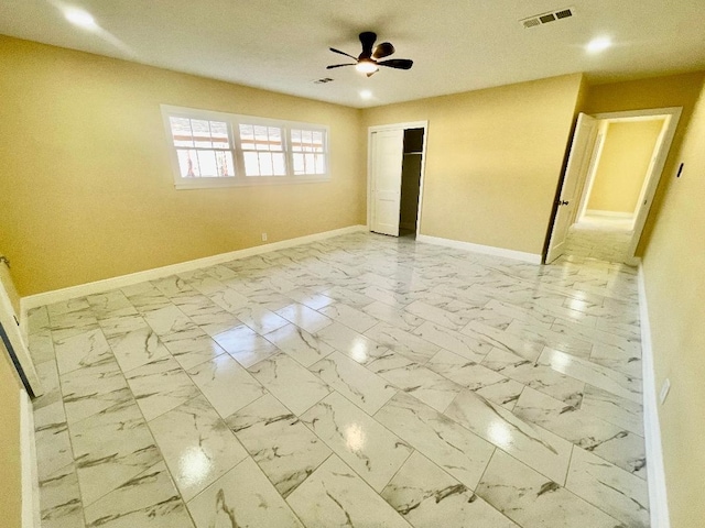 empty room with ceiling fan