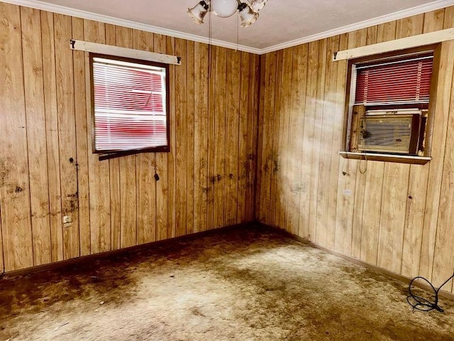 733 Phyllis Ave, Port Arthur, TX 77640 - unfurnished room featuring carpet floors, wooden walls, ornamental molding, and cooling unit