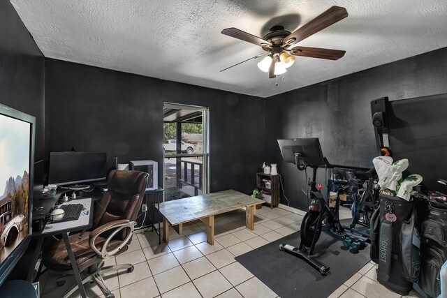 1432 W Palm Dr, Winnie, TX 77665 - office with ceiling fan, a textured ceiling, and light tile patterned floors