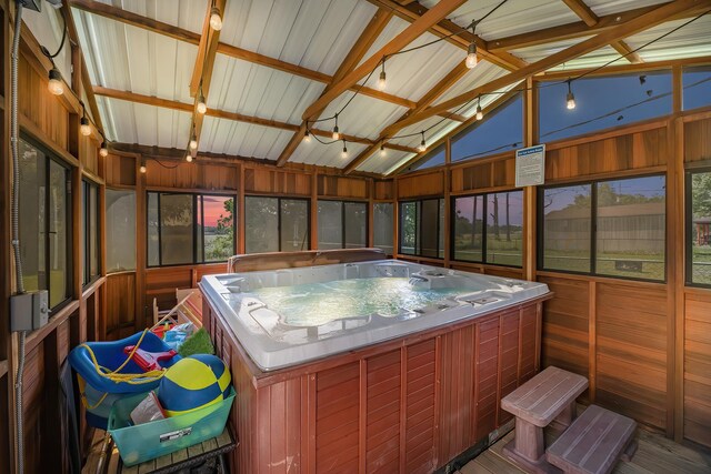 1432 W Palm Dr, Winnie, TX 77665 - sunroom / solarium featuring a hot tub and lofted ceiling