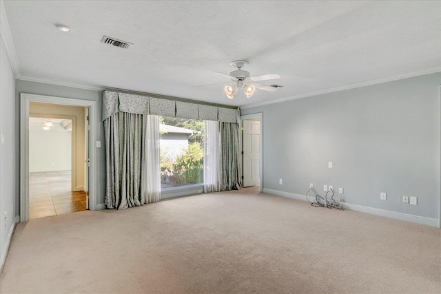 6325 Gladys Ave, Beaumont, TX 77706 - spare room featuring light colored carpet, crown molding, ceiling fan, and a textured ceiling