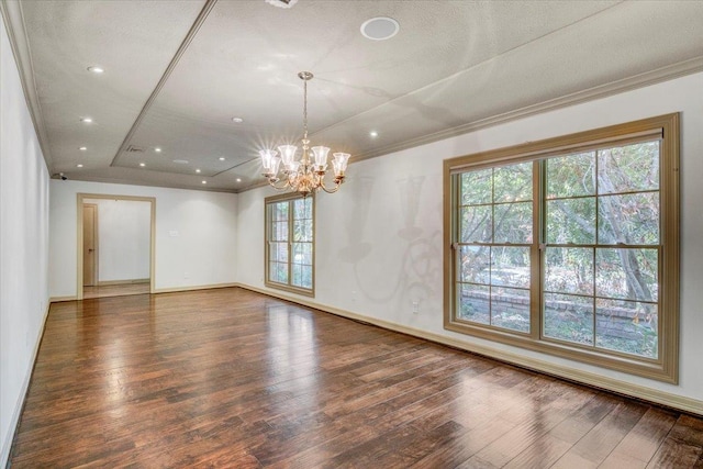 6325 Gladys Ave, Beaumont, TX 77706 - empty room featuring wood-type flooring, a chandelier, ornamental molding, and a tray ceiling