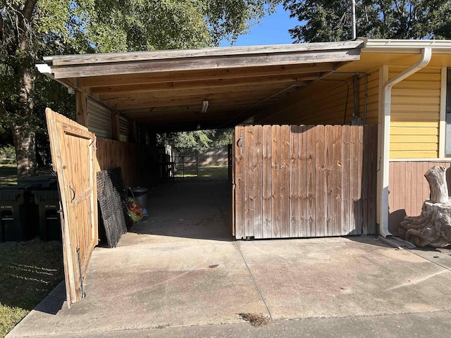 view of vehicle parking featuring a carport