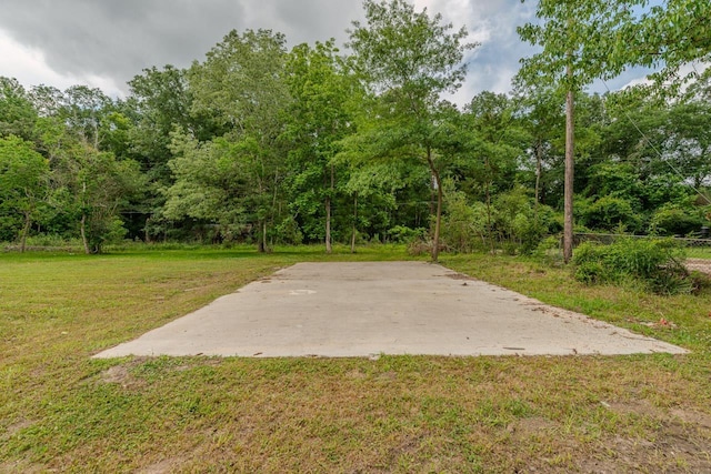 319 Pinemont Dr, Beaumont, TX 77659 - exterior space featuring a wooded view