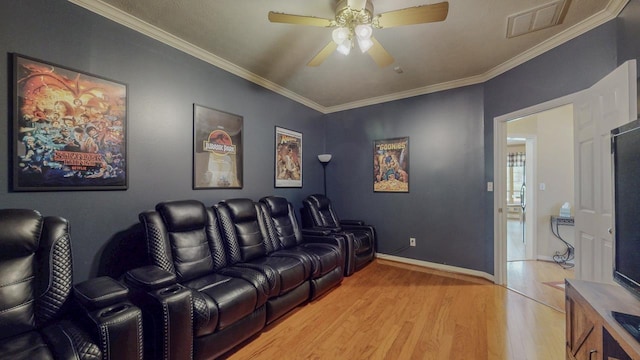 7640 Merion Dr, Beaumont, TX 77707 - cinema featuring light wood-type flooring, ceiling fan, and crown molding