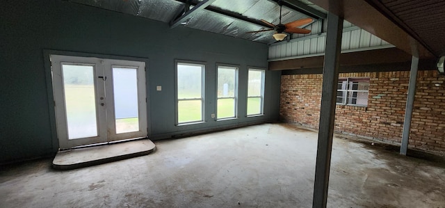 interior space featuring ceiling fan and french doors