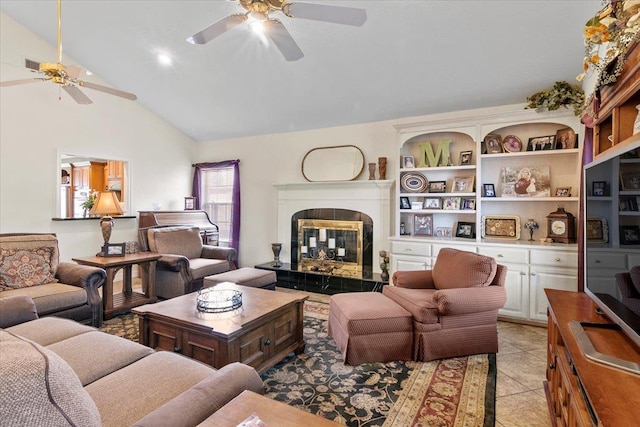 living room featuring light tile patterned flooring, high vaulted ceiling, ceiling fan, and a tiled fireplace