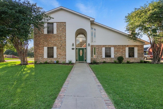 view of front of property with a front lawn