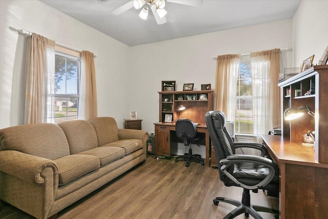 office area featuring hardwood / wood-style flooring, ceiling fan, and a healthy amount of sunlight