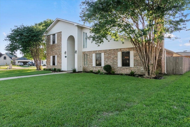 view of front facade with a front yard