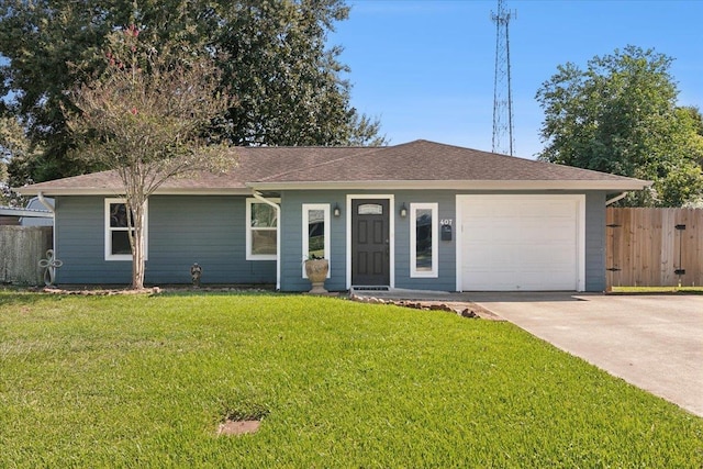 ranch-style home with a garage and a front yard