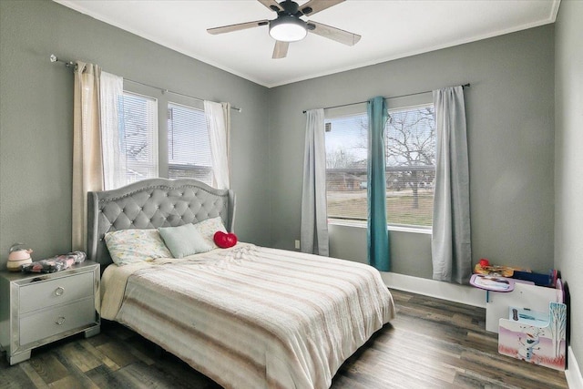 bedroom featuring ceiling fan and dark hardwood / wood-style floors