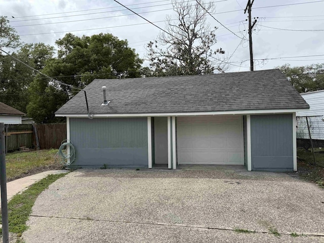 detached garage with fence