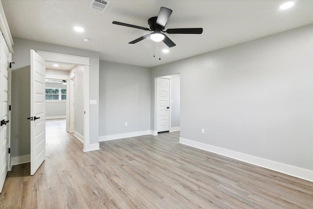 unfurnished bedroom with light wood-type flooring and ceiling fan