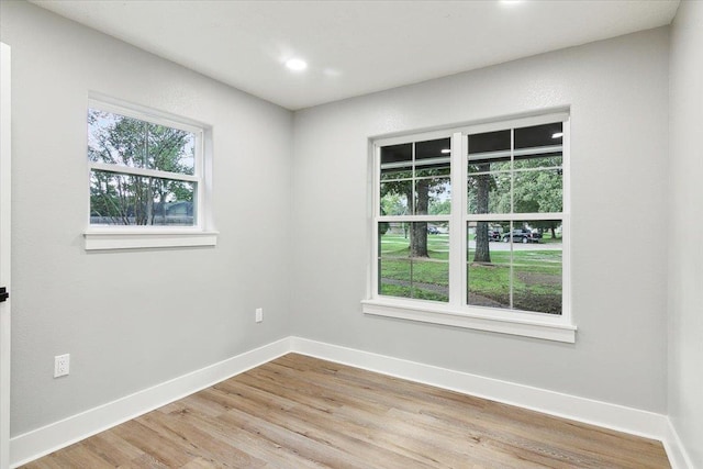 empty room featuring light hardwood / wood-style floors