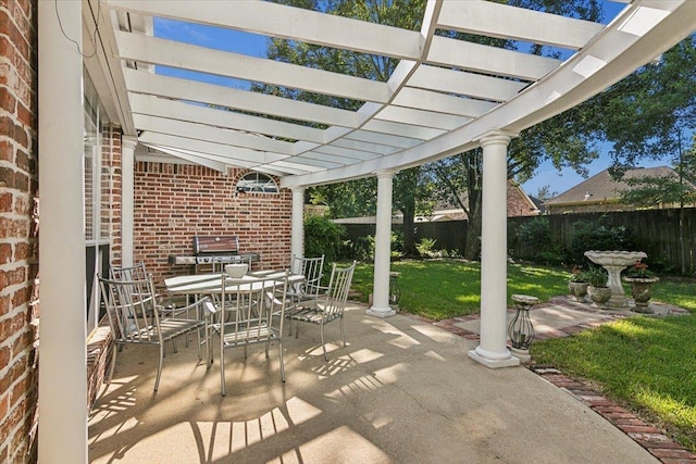 view of patio featuring a pergola, outdoor dining space, and a fenced backyard