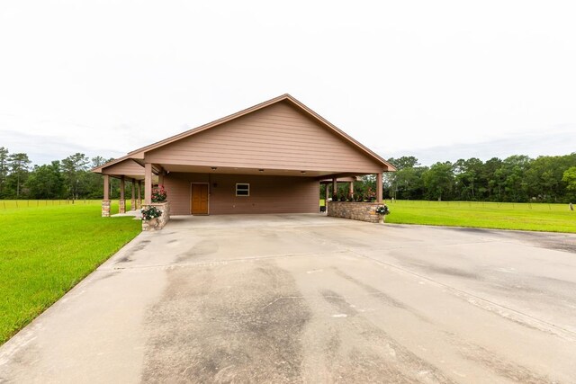 114 Holmes Rd, Lumberton, TX 77657 - view of front of house featuring a front lawn, driveway, and an attached carport