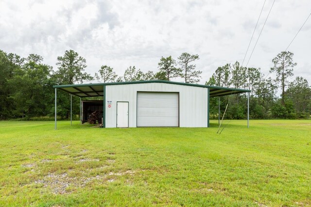 114 Holmes Rd, Lumberton, TX 77657 - view of pole building featuring a lawn